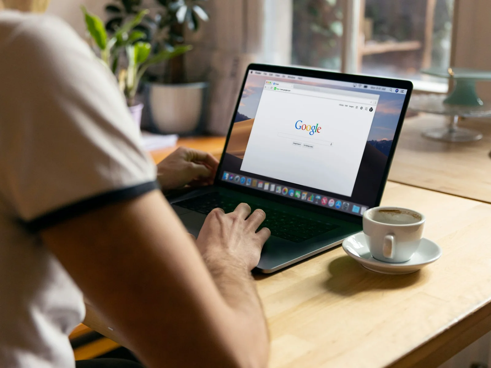Person at laptop studting about SEO for Beginners - How to Rank on Google in 2025
